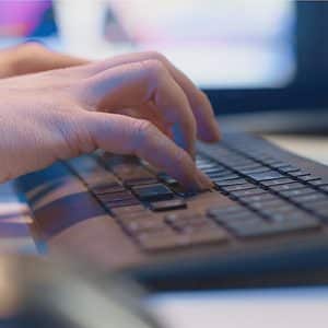 Photo of keyboard being used Goshen Public Library and Historical Society Digital-Resources